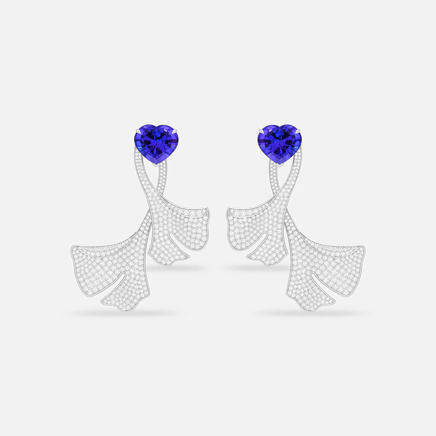Tanzanite and diamond flare earrings