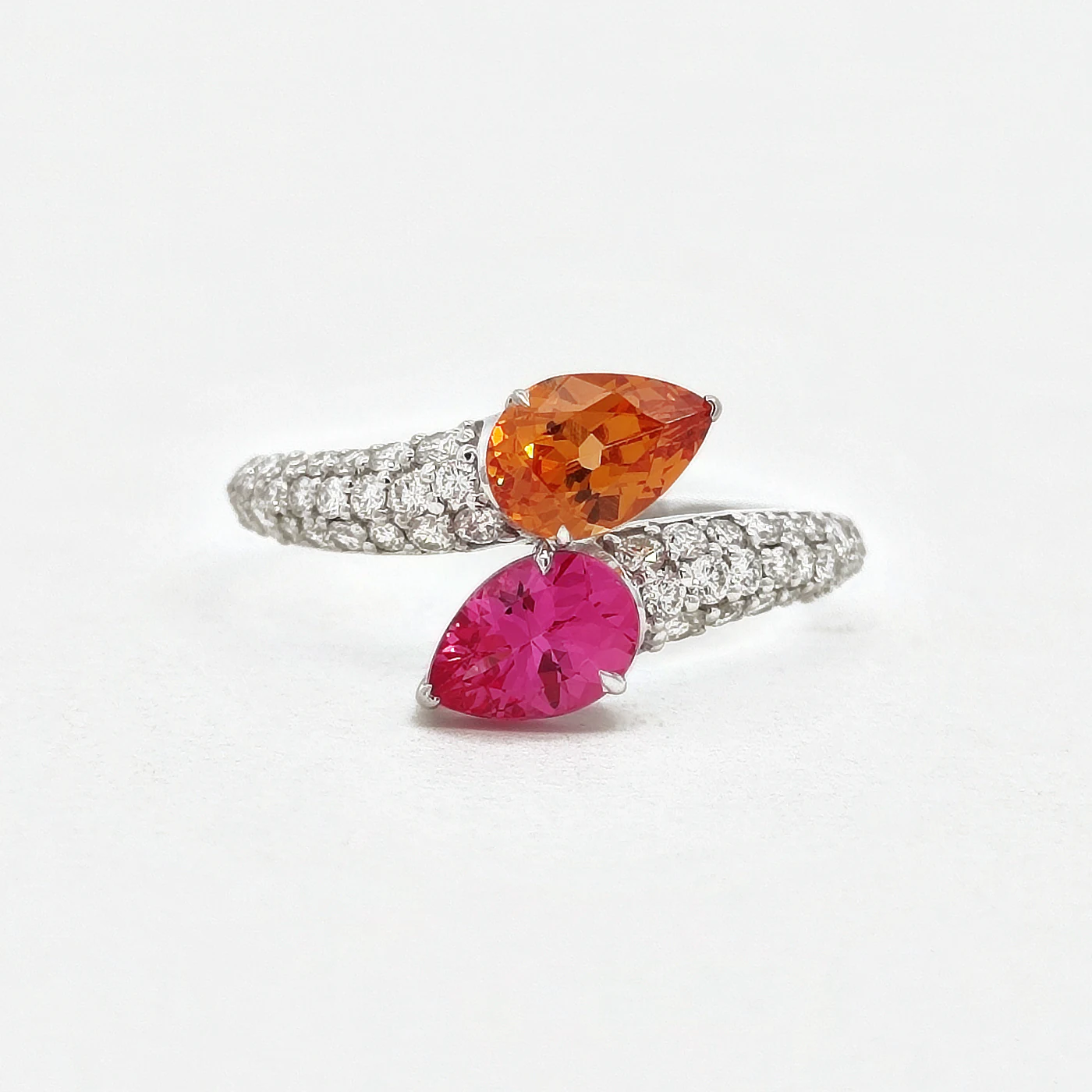 Pink spinel, spessartite and diamond ring