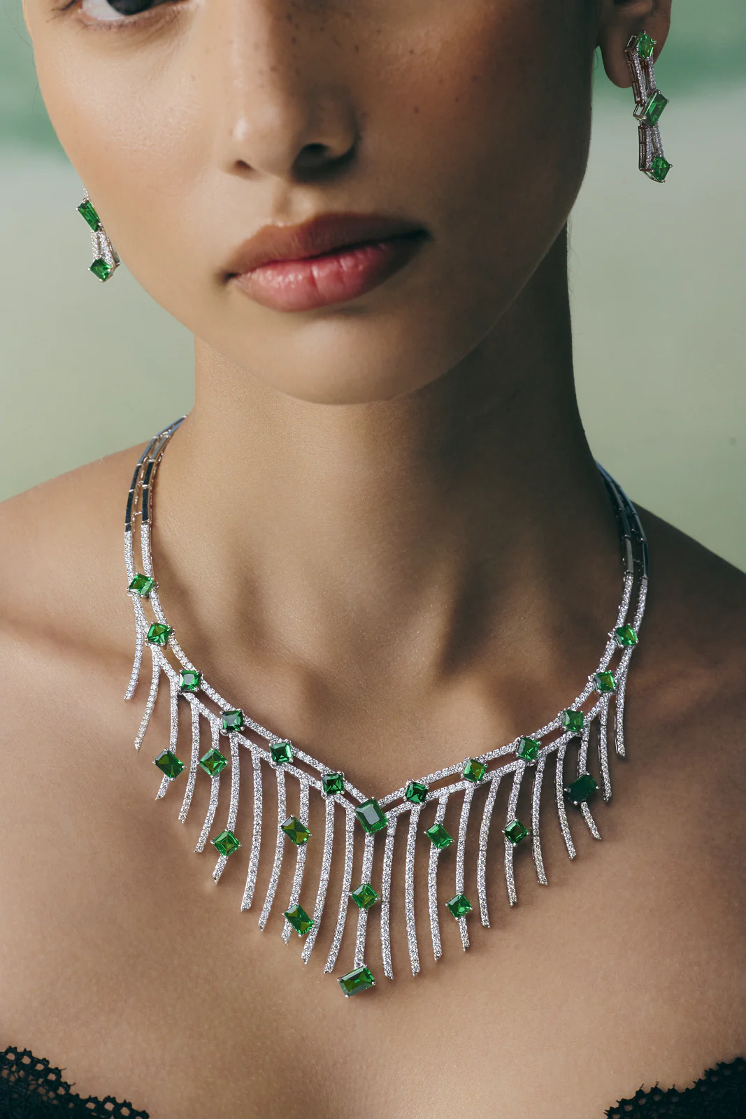 Tsavorite necklace worn.
