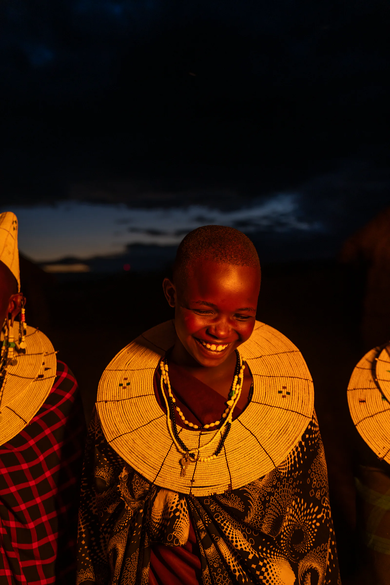 Maasai women gathered at dusk in northern Tanzania.