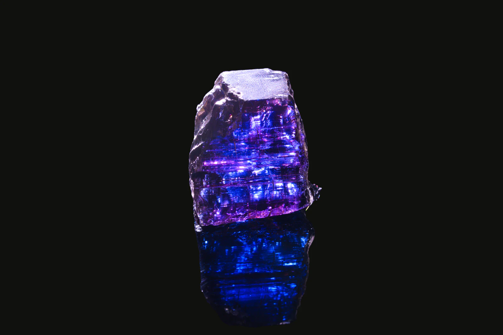 Rough tanzanite on black.